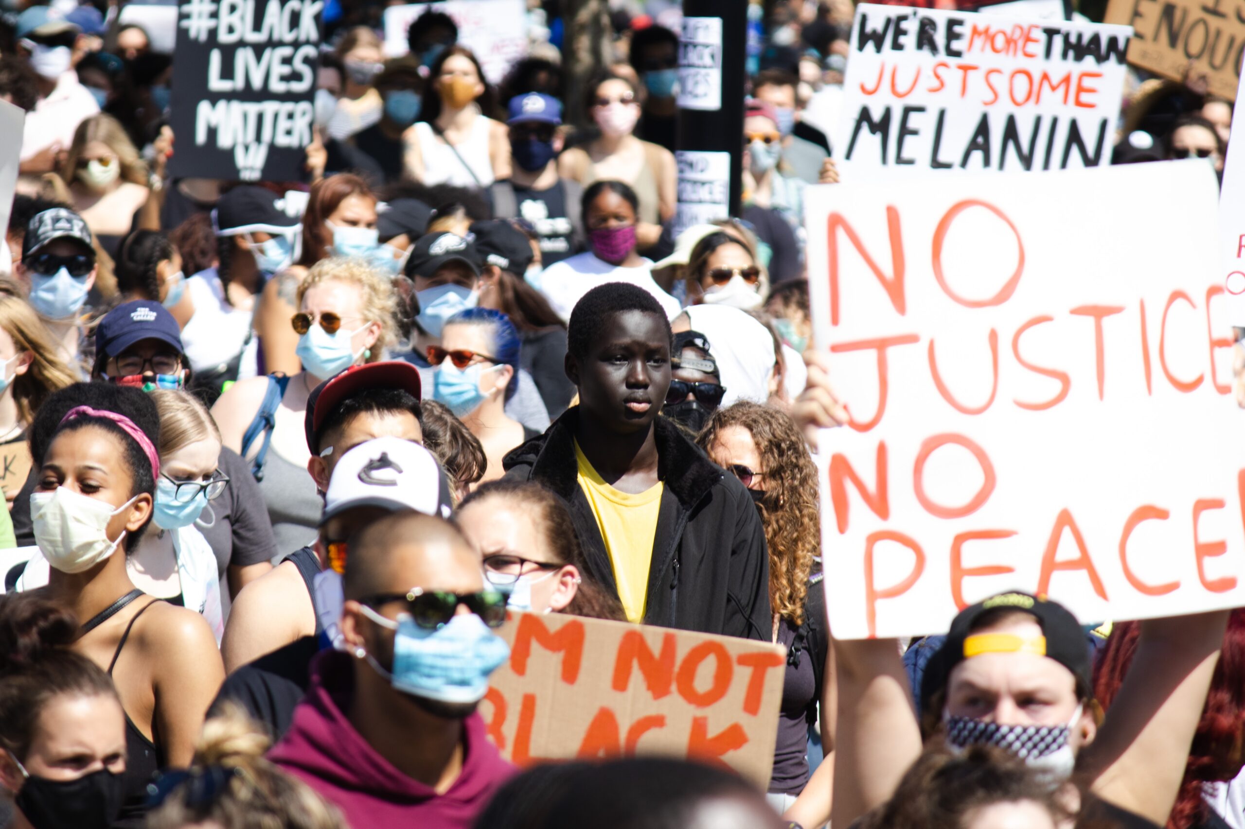 BLM march with sign no justice no peace