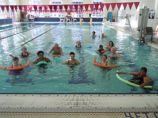 Adult doing aqua aerobics